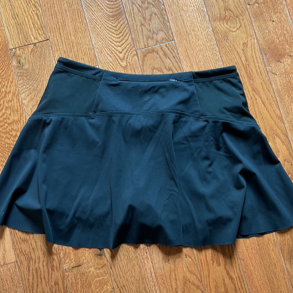 Athleta Tennis Skort. Size M. Black. Match point skort. Inside pockets,Like new